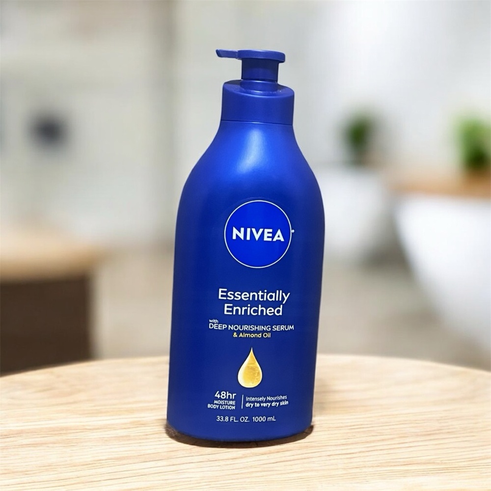 NIVEA Blue Moisturizer with Almond Oil 48 hr body lotion 33.8 Fl